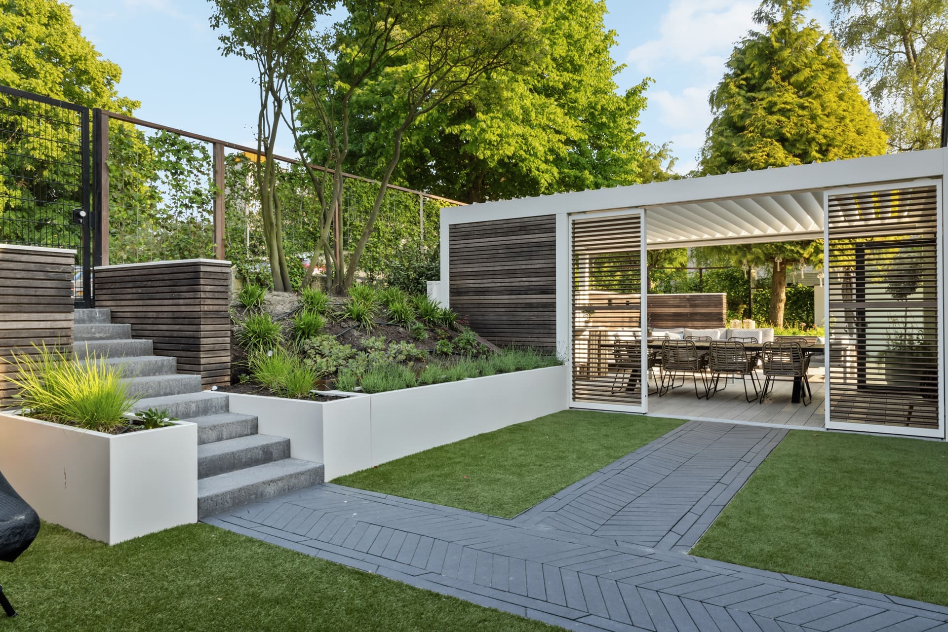 Modern garden with prominent outdoor kitchen